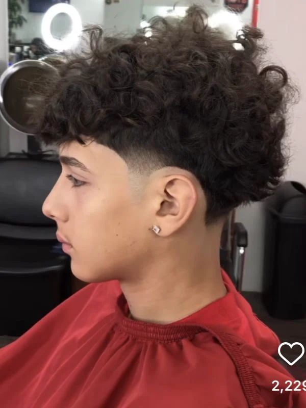 Low Taper Fade Fluffy Hair With Middle Part