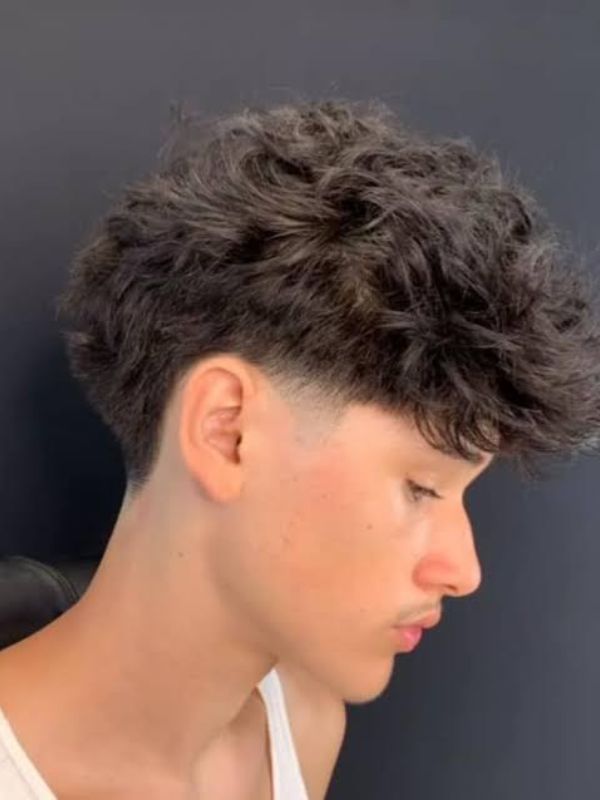 Low Taper Fade Textured Fringe Blowout