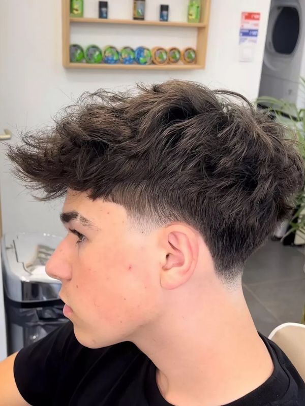 _Low Taper Fade With Messy Fluffy Hair