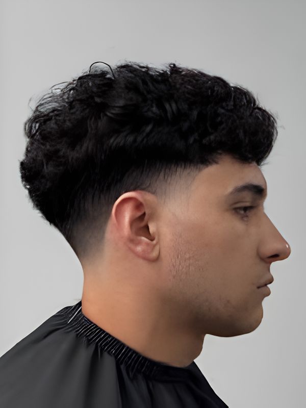 Curly Pompadour with a Tapered Edge