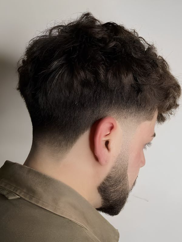 Curly Undercut Blended with a Taper Fade